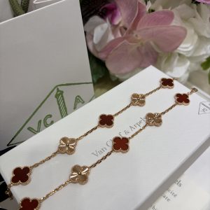 Van Cleef & Arpels’ new red agate laser-engraved quatrefoil rose gold five-strand bracelet.