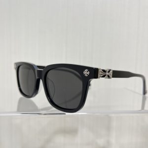 Chrome Heart* sunglasses.