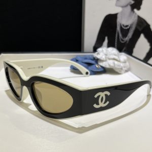 Chane* Panda-colored sunglasses.